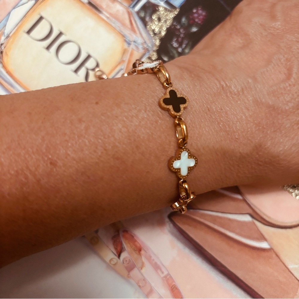 Gold Clover Link Bracelet with Black and White Accents